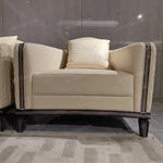 Cream Leather Sofa Set with Wave Quilted Craftsmanship, Natural Wood Veneer & Embroidered Wing Logo Accents